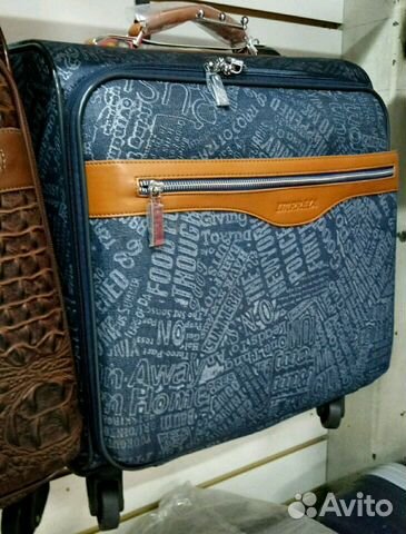 Новый чемодан на колесах - кейс-пилот Новый чемодан на колесах - кейс-пилот