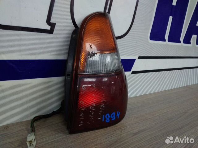 Фонарь задний задний правый Nissan Wingroad WHY10 Фонарь задний задний правый Nissan Wingroad WHY10