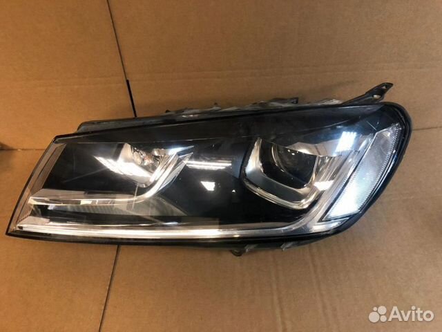 Фара левая Volkswagen Touareg