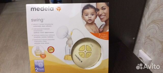 Молокоотсос medela swing