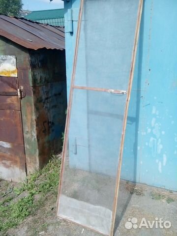 Дверь для балкона с москитной сеткой