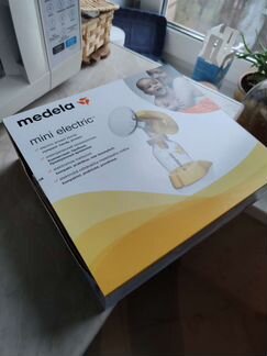 Молокоотсос medela mini electric электрический