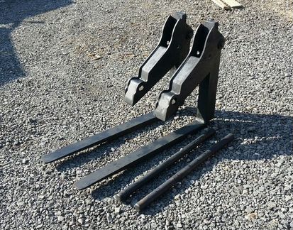 Вилы паллетные откидные 2 тонны для Caterpillar