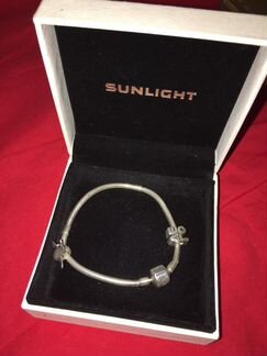 Серебряный браслет sunlight с шармами обмен