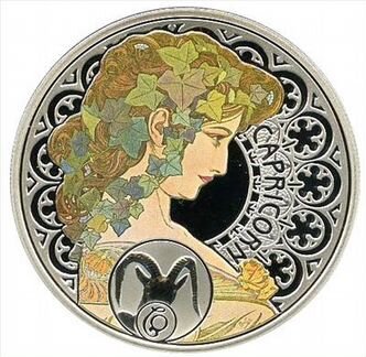 Монета Козерог Художник Муха А. серебро Ниуэ 2011г